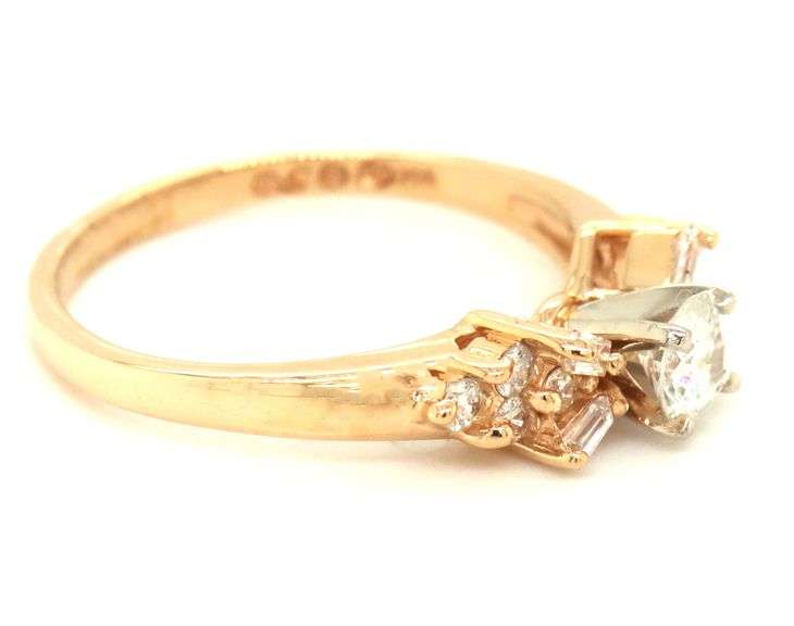 14kt Yellow gold 0.29ct RBC in 0.15ctw RBC and Baguette diamond engagement ring