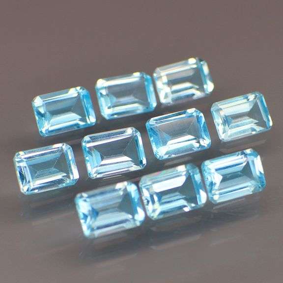 High fire 13.04ct Swiss blue Topaz set