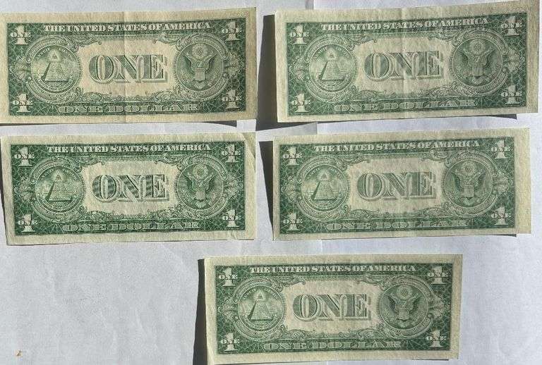 Five $1 1935E Near Unc Silver Certificates.