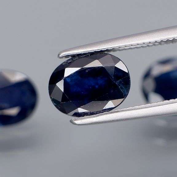 Beautifully colored 3.82ct ink blue Sapphire set