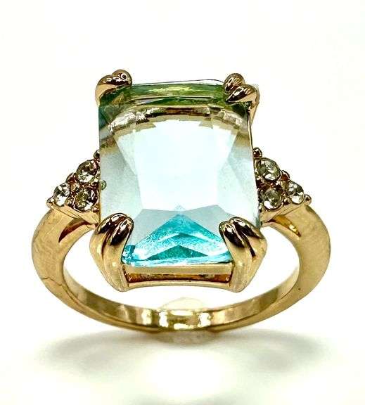 Breathtaking 14 kt Yellow Gold Plate 6.5 Ct Emerald Cut Simulated Sky Blue Topaz Ring