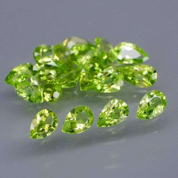 Fantastic 8.62ct 6x4mm pear cut Peridot set!