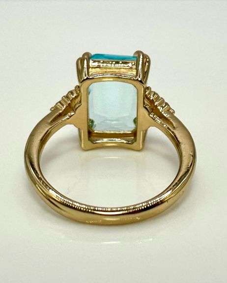 Breathtaking 14 kt Yellow Gold Plate 6.5 Ct Emerald Cut Simulated Sky Blue Topaz Ring