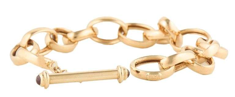 Ruby Cabochon Polished Oval Link Toggle Bracelet in 14K