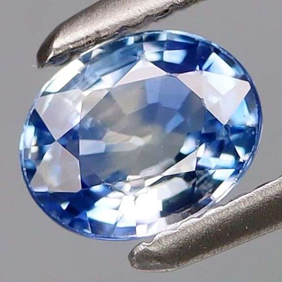 VS grade! Solitaire sized! .57ct bi-color Ceylon Sapphire! Heated only!