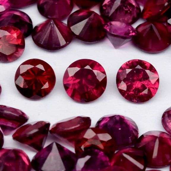 Heavy! 20.19ct violet pink Rhodolite Garnet set!
