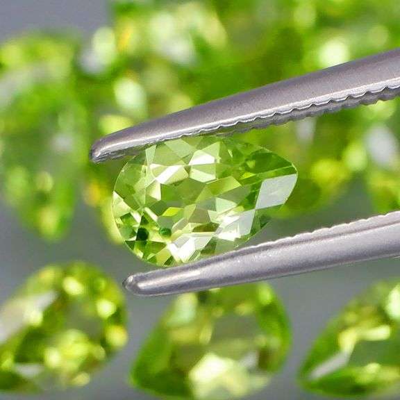 Fantastic 8.62ct 6x4mm pear cut Peridot set!