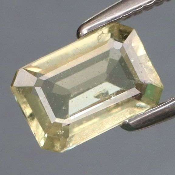 Untreated! Emerald cut! .95ct wheat blonde Sapphire!