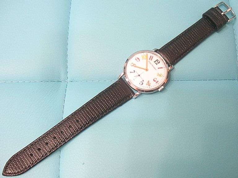 CONTENT OF SAFE DEPOSIT BOX: RARE GIRARD PERREGAUX ART DECO MEN'S WATCH