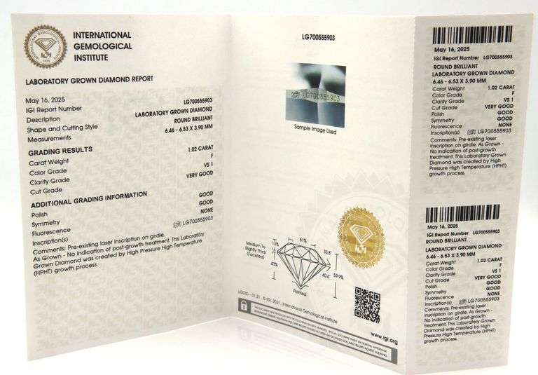 2.10ctw round brilliant cut Lab grown diamond in 0.16ctw huggie hoop
