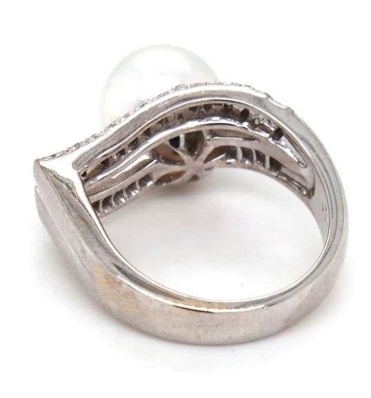 18kt White gold 10mm pearl and channel set baguette and diamond pave abstract ring