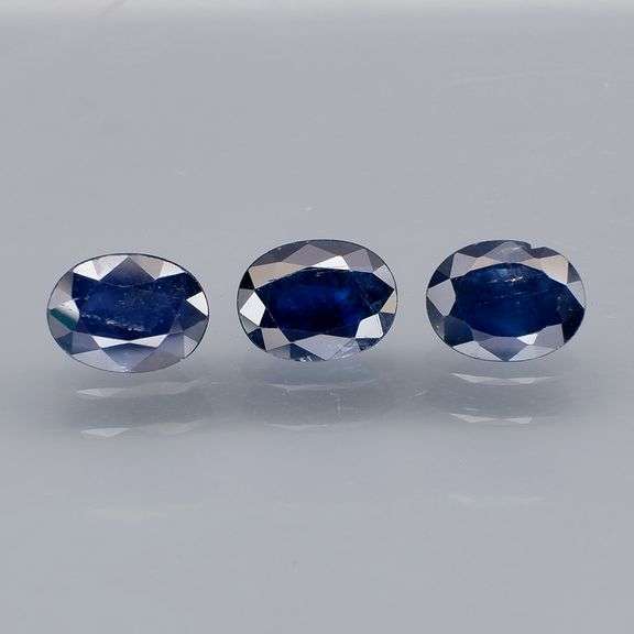 Beautifully colored 3.82ct ink blue Sapphire set