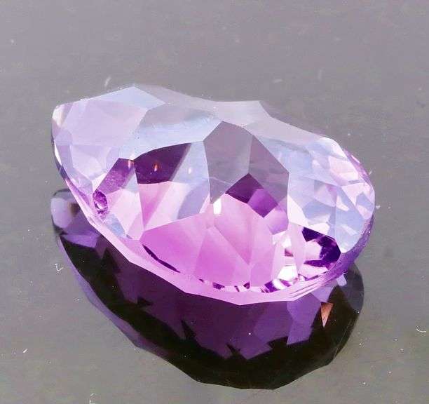Brilliant high fire 12.06ct natural Amethyst