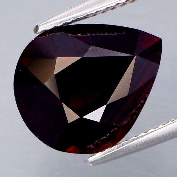 Elegant 8.24ct midnight crimson Mozambique Garnet
