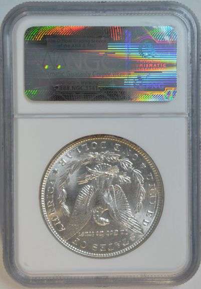 Satiny-white Gem BU 1886 Morgan Silver Dollar. NGC MS65