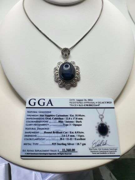 Very large 35.5ctw Star Blue Sapphire Cabochon with Natural Diamond Halo – Oval Cut Elegance pendent