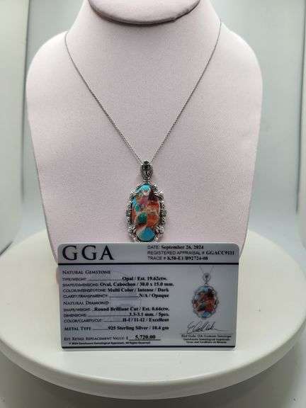 Very rare and collectable 19.62 ctw opal and diamond pendent