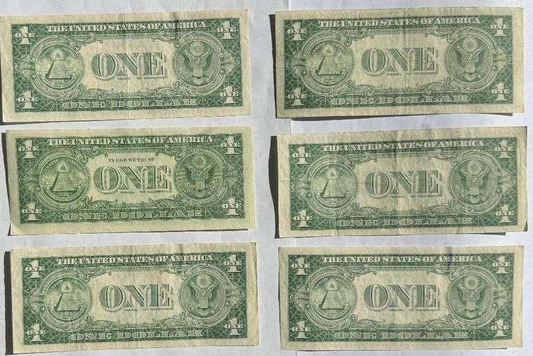 Six $1 1935 E Near Unc Silver Certificates.