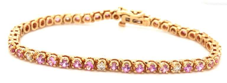 14kt Yellow gold pink sapphire and diamond tennis bracelet
