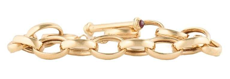 Ruby Cabochon Polished Oval Link Toggle Bracelet in 14K