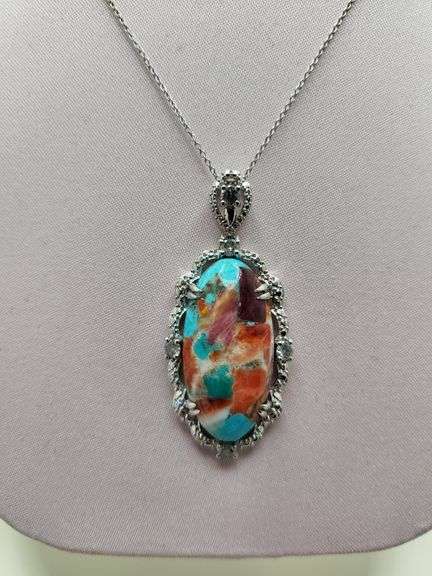 Very rare and collectable 19.62 ctw opal and diamond pendent