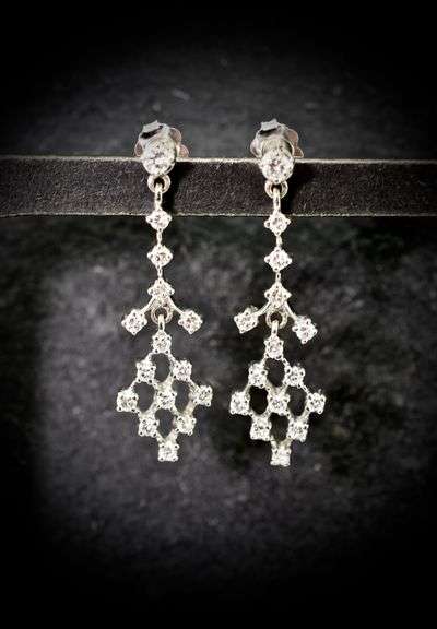 Feminine 14K White Gold Diamond Dangle Earrings