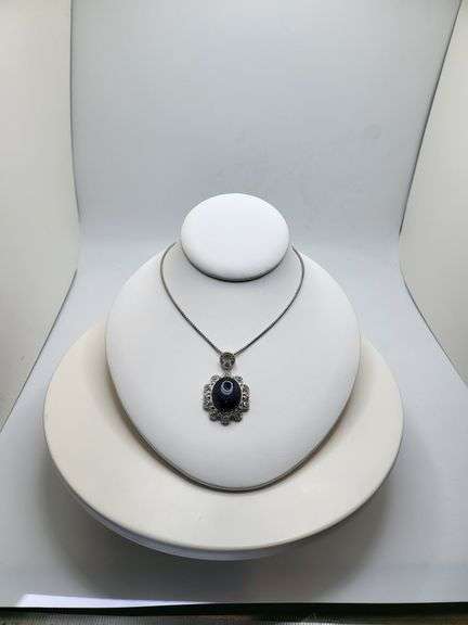 Very large 35.5ctw Star Blue Sapphire Cabochon with Natural Diamond Halo – Oval Cut Elegance pendent