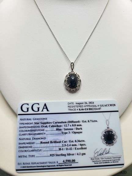 8.71ctw Star Blue Sapphire Cabochon with Natural Diamond Halo – Oval Cut Elegance pendent