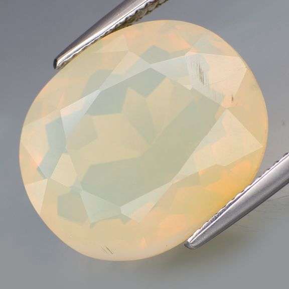 Glowing 13.16ct phantom white Fire Opal!