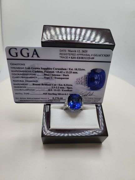 Magnificent 18 ctw sapphire lab grown v, very fine quality with natural diamond set in silver ring