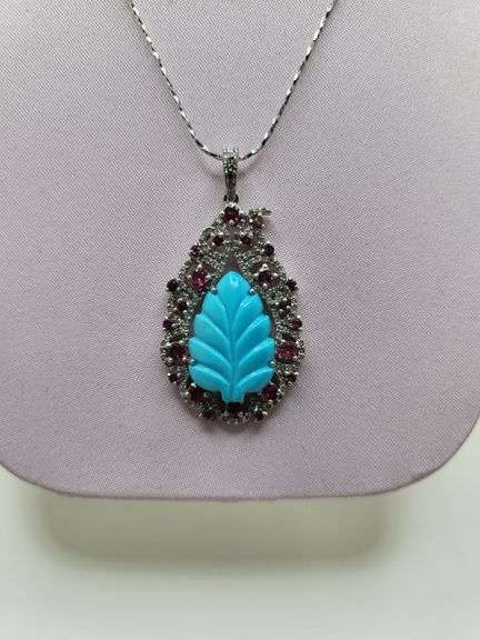 Magnificent 10.8ctw turquise with ruby and diamond pendent set in Silver – CGA Certified