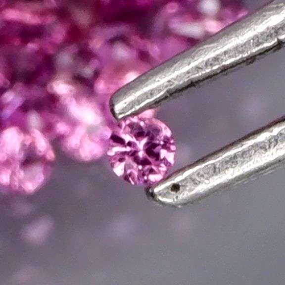215 piece set of pink Sapphires weighing 2 carats!!