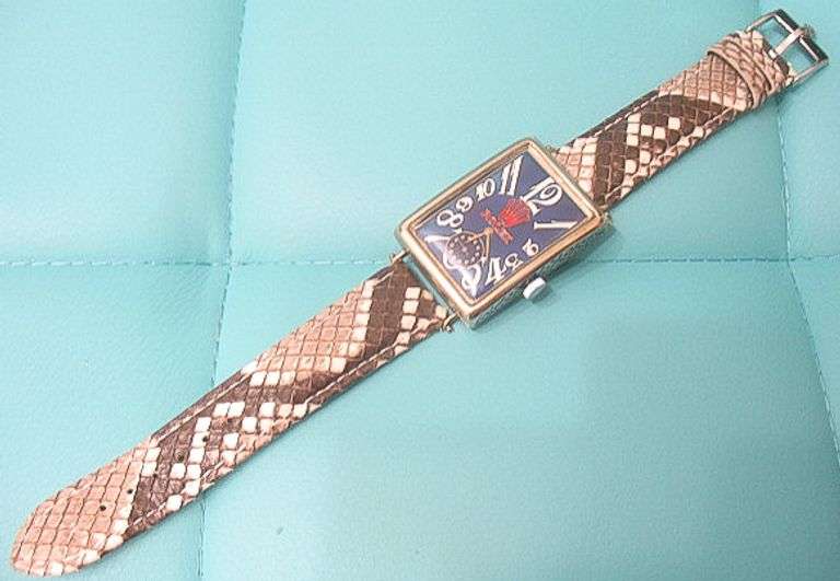 CONTENT OF SAFE DEPOSIT BOX: RARE ROLEX ART DECO MEN'S WATCH