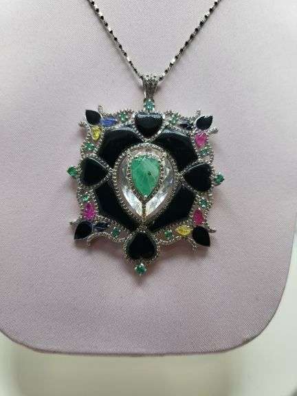 Very rare and collectable 26.14 ctw onyx, sapphire, ruby, emerald pendent