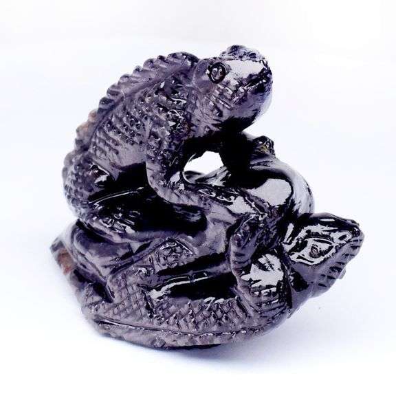 Incredible 131.71ct Tanzanian Black Sapphire carving!