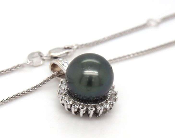 14kt White gold 12mm Tahitian pearl and diamond halo pendant on chain