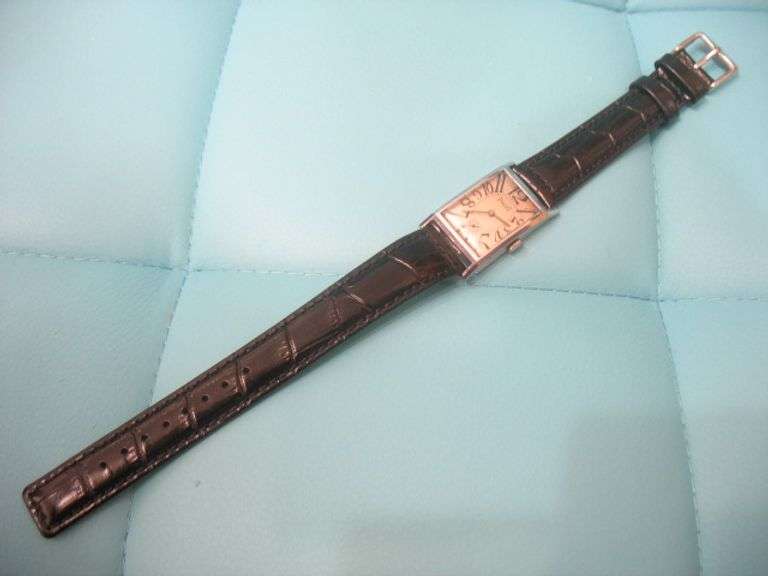 CONTENT OF SAFE DEPOSIT BOX: RARE ART DECO PIAGET MEN'S WATCH