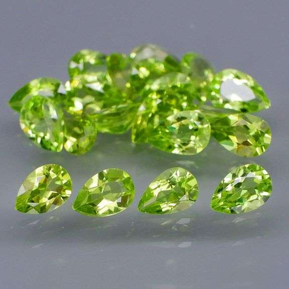 Fantastic 8.62ct 6x4mm pear cut Peridot set!