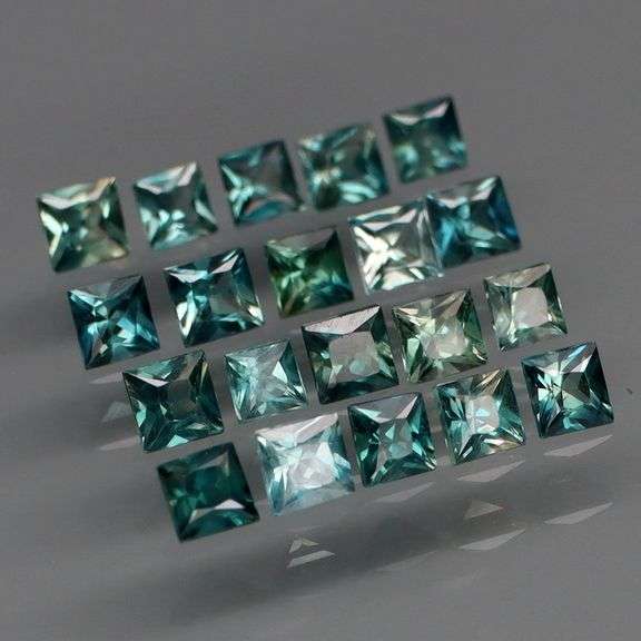 Heated only! 2.63ct blue green Sapphire set!