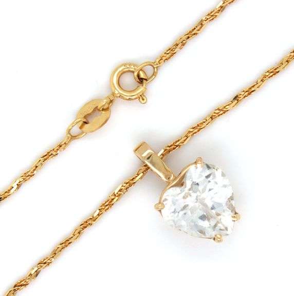 14kt Yellow gold cubic zirconia heart shaped pendant on chain