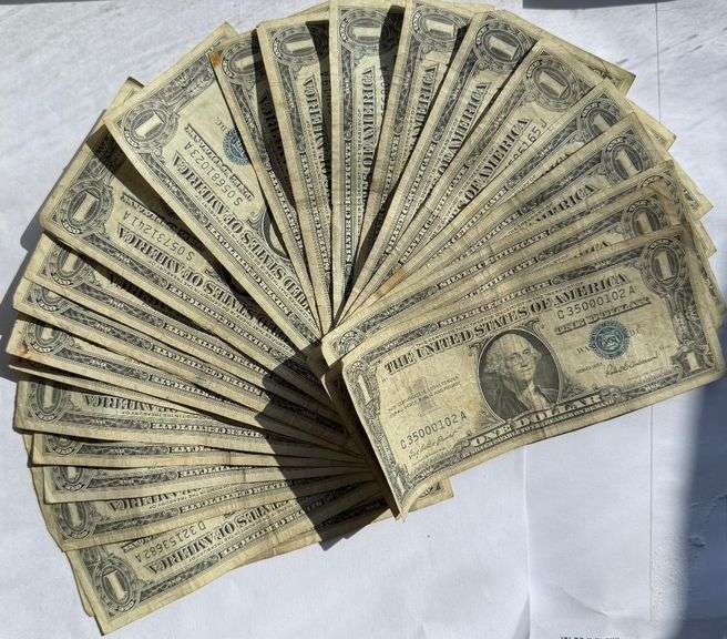 Twenty Five 1957 Series $1 Silver Certificates