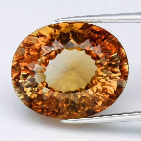 Fiery flashing 17.50ct VVS amber Imperial Topaz