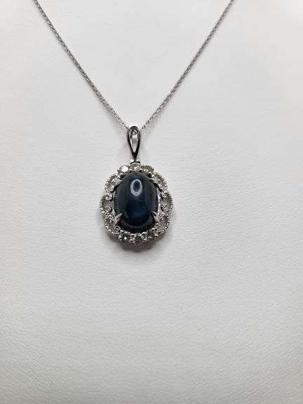 8.71ctw Star Blue Sapphire Cabochon with Natural Diamond Halo – Oval Cut Elegance pendent