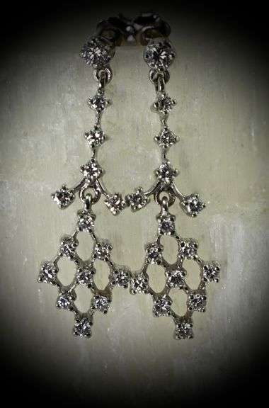 Feminine 14K White Gold Diamond Dangle Earrings