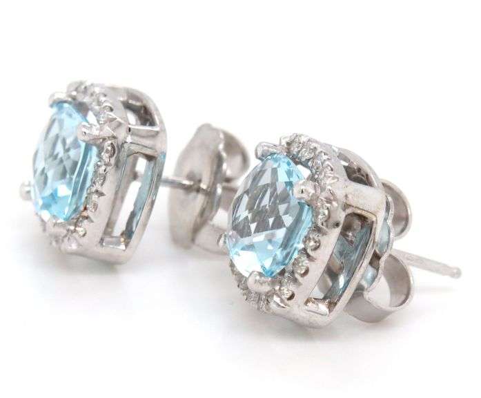 14kt White gold blue topaz and diamond earrings