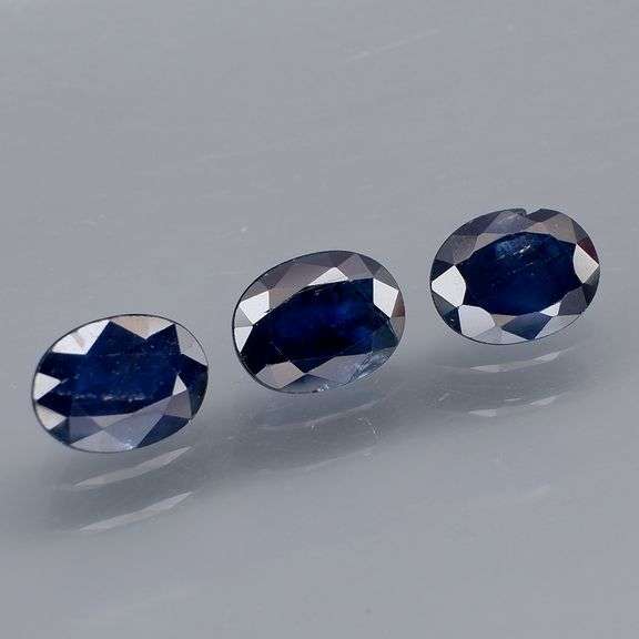 Beautifully colored 3.82ct ink blue Sapphire set