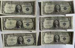 Six $1 1935 E Near Unc Silver Certificates.