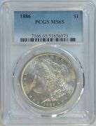 Snowy-white Gem BU 1886 Morgan Silver Dollar. PCGS MS65