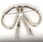 Sterling silver and 14kt Yellow gold accent bow brooch