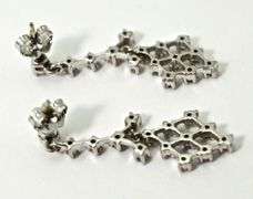 Feminine 14K White Gold Diamond Dangle Earrings